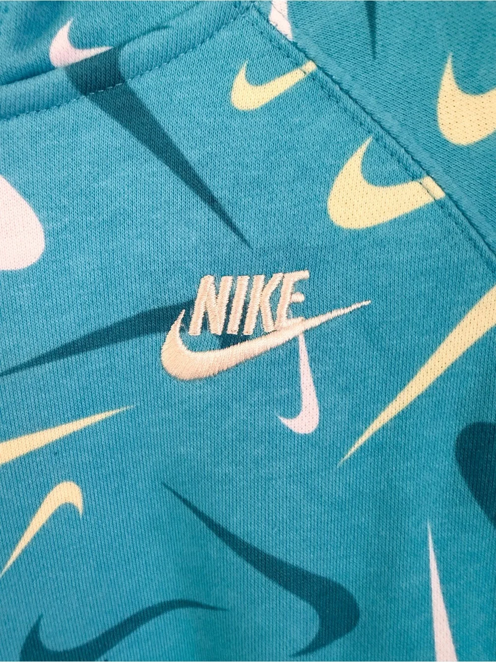 Nike Turquoise Teal Hoodie with White & Yellow Swoosh Pattern